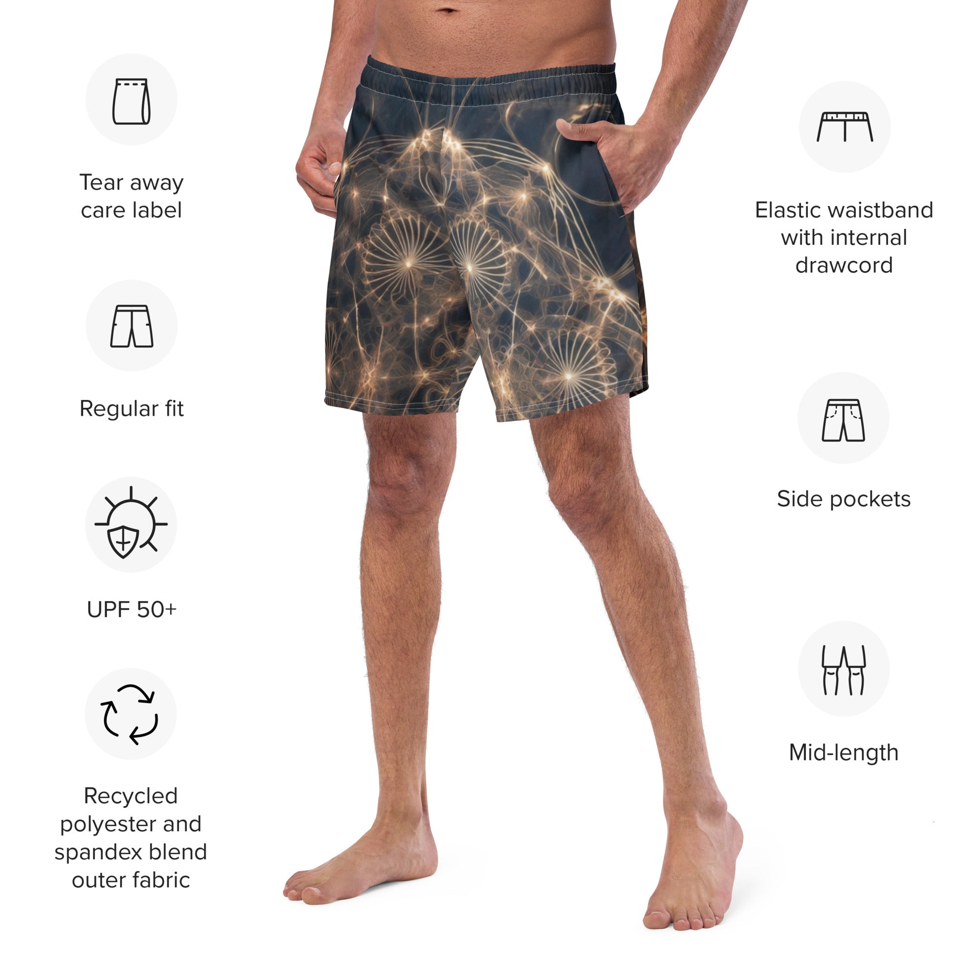 Cymatics Sacred Geometry Swim Trunks flat lay showing golden vibration pattern on dark background