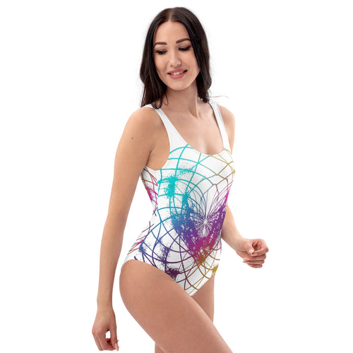 Side view of woman wearing Cymatics Heart Sacred Geometry One-Piece Swimsuit showing cheeky fit and heart cymatics design