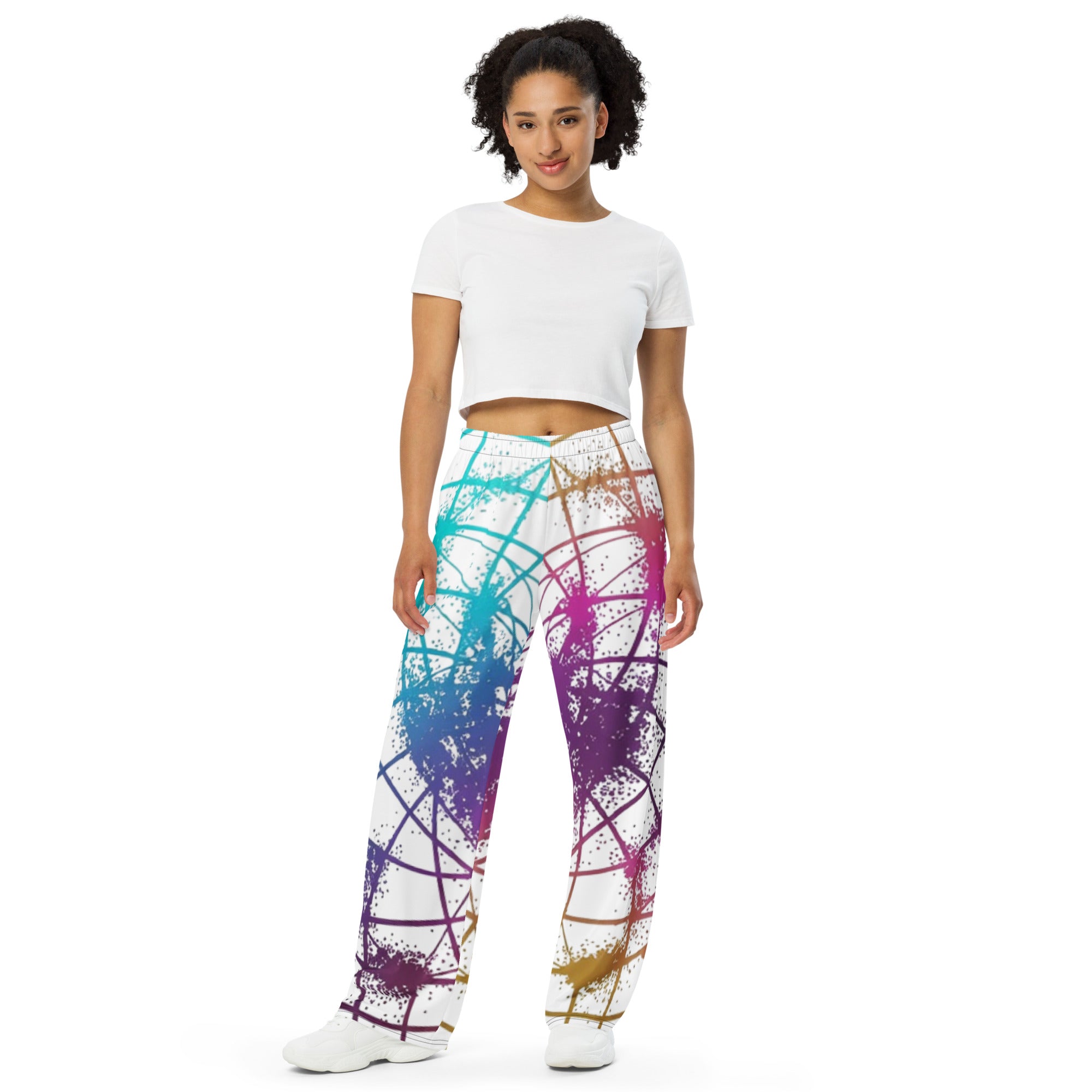 Woman standing in Cymatics Heart Sacred Geometry Wide-Leg Pants, comfortable spiritual yoga pants with heart cymatics design