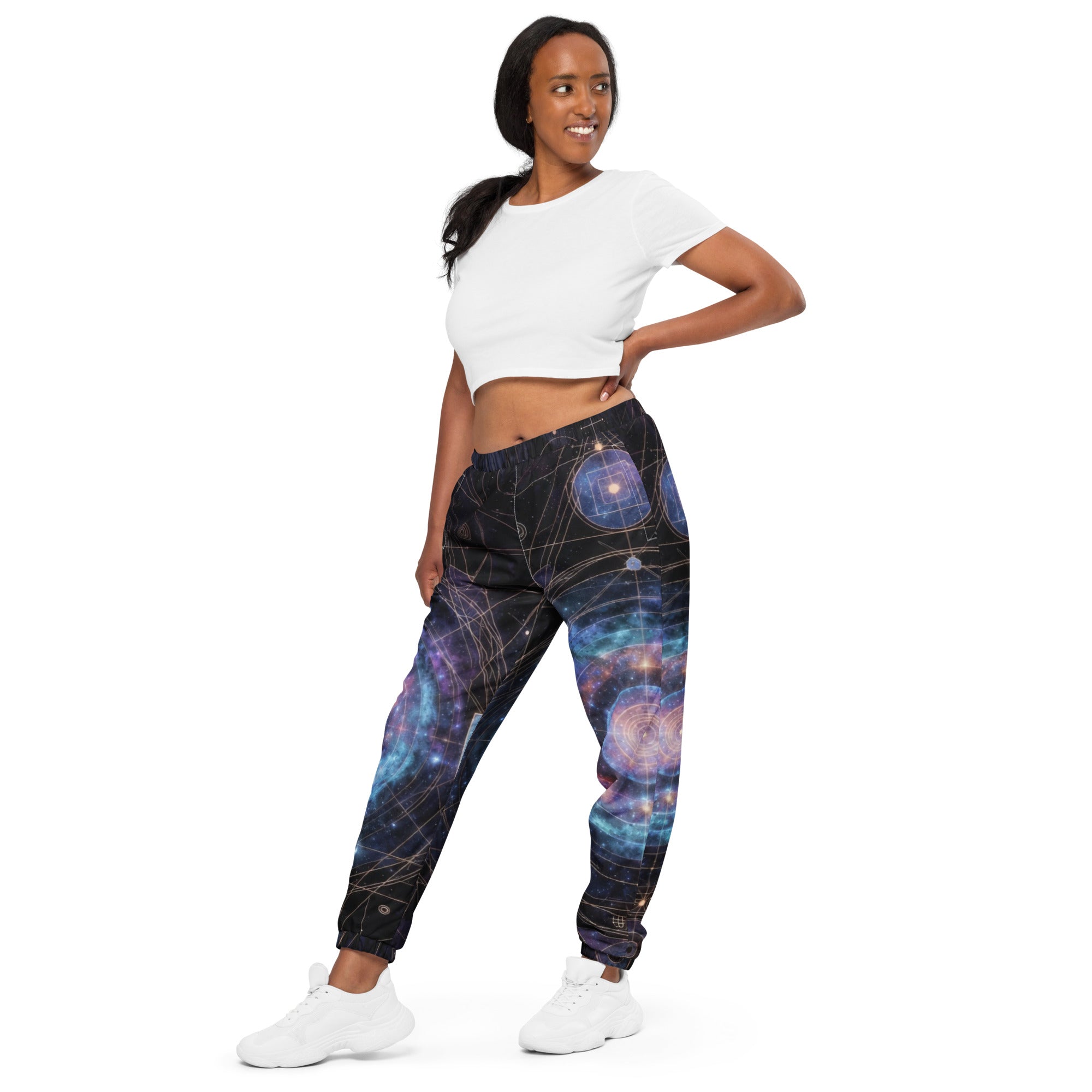 Close-up detail of galaxy sacred geometry pattern on unisex track pants